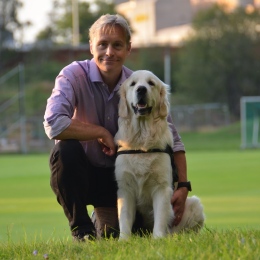 Dog and man on a soccer field. Photo: H Katz.